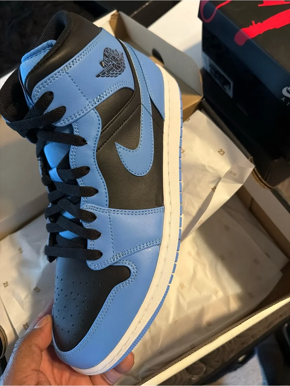 Jordan 1 Mid - Black and University Blue
